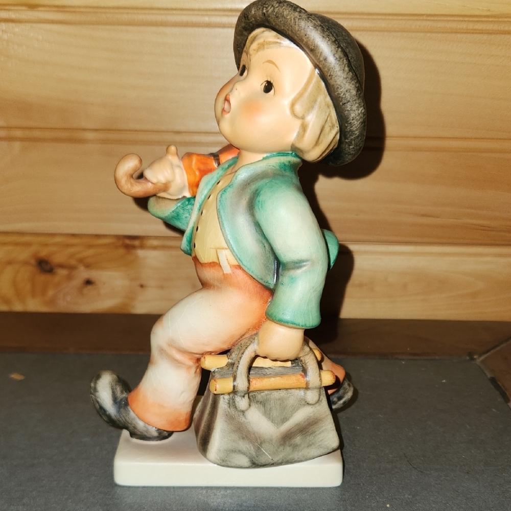 Goebel Figurine with Green Jacket and Orange Pants